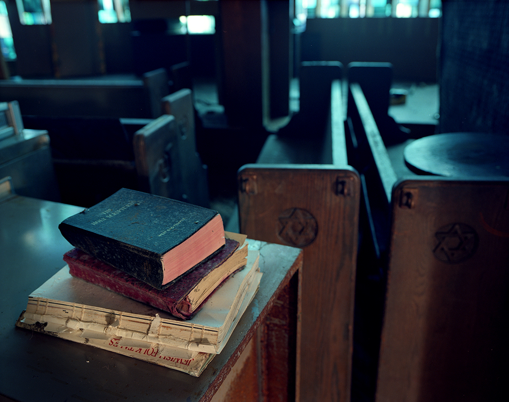 Susannah Ray<br /> <em>Prayer Books, West End Temple, Neponsit, NY, December</em>, 2012<br /> Digital C-Prints<br /> 24 x 30" &nbsp; &nbsp;Edition of 10<br /> 40 x 50" &nbsp; &nbsp;Edition of 5