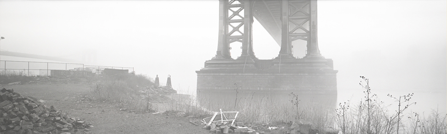 Jed Devine<br /> <em>Base of the Manhattan Bridge and Rubble in Fog,&nbsp;</em><br /> <em>from a vacant lot, Brooklyn, 1985</em><br /> 2 x 6.5", Platinum-palladium print on Japanese rice paper
