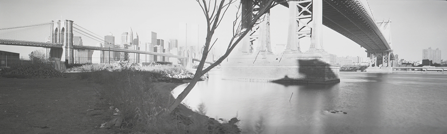 Jed Devine<br /> <em>Morning Light on the Manhattan Bridge,&nbsp;</em><br /> <em>from John Street, Brooklyn, 1995</em><br /> 2 x 6.5", Platinum-palladium print on Japanese rice paper