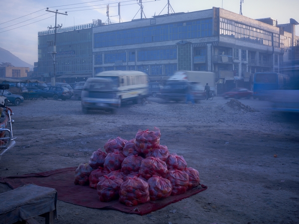 Simon Norfolk<br /> <em>Pakistani Apples For Sale At A Roadside Market, </em>2010<br /> Archival pigment ink prints<br /> 20 x 24" &nbsp; &nbsp;Edition of 7 (plus 2 APs)<br /> 40 x 50" &nbsp; &nbsp;Edition of 7 (plus 2 APs)