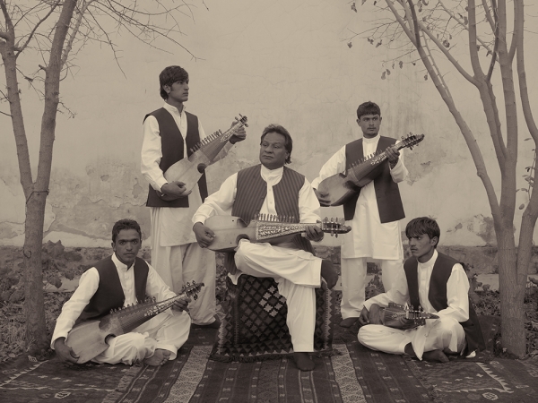 Simon Norfolk<br /> <em>At A Music School In Kabul, Boys Are Taught The Traditional Afghan Instrument, The Rubab, </em>2010<br /> Archival pigment ink prints<br /> 20 x 24" &nbsp; &nbsp;Edition of 7 (plus 2 APs)<br /> 40 x 50" &nbsp; &nbsp;Edition of 7 (plus 2 APs)