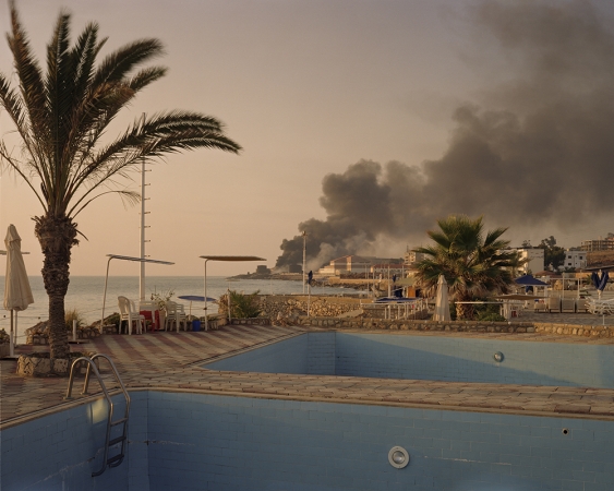 Simon Norfolk<br /> <em>Storage Depot for Powerstation Jiyeh, From Sand's Rock Resort, Lebanon, </em>2006<br /> Digital chromogenic prints<br /> 20 x 24" &nbsp; Edition of 10 (plus 3 APs)<br /> 40 x 50" &nbsp; Edition of 10 (plus 3 APs)